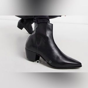 ASOS DESIGN stacked heel western chelsea boots in black.